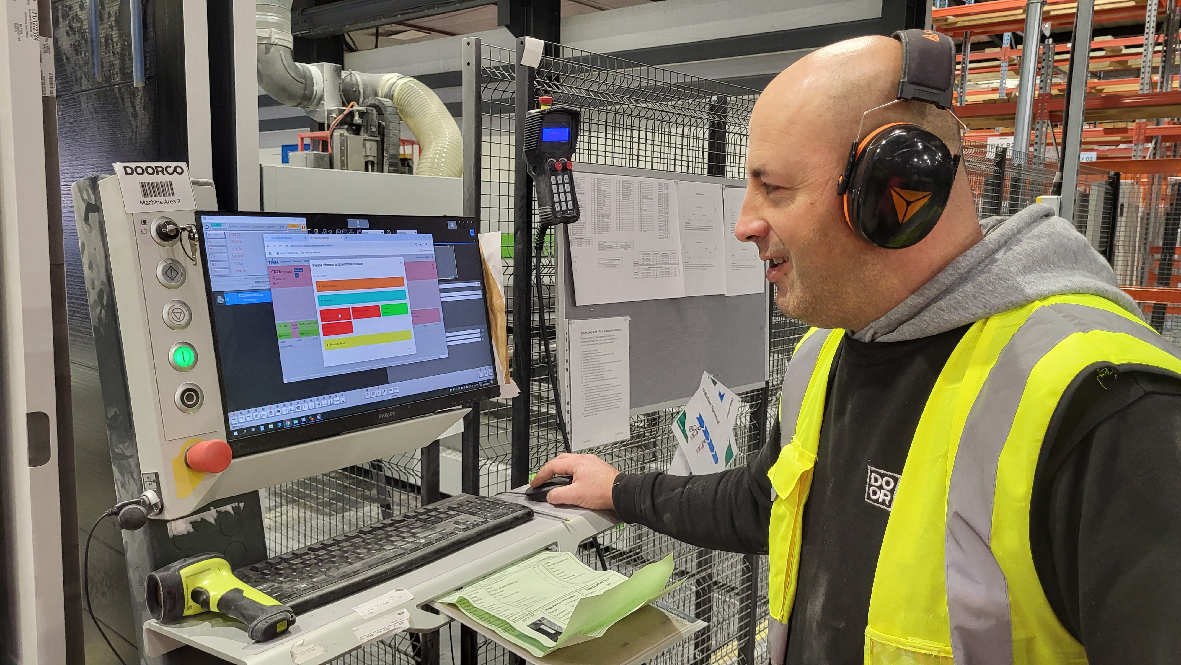 DoorCo Operator using TrackMyMachines on his CNC control terminal